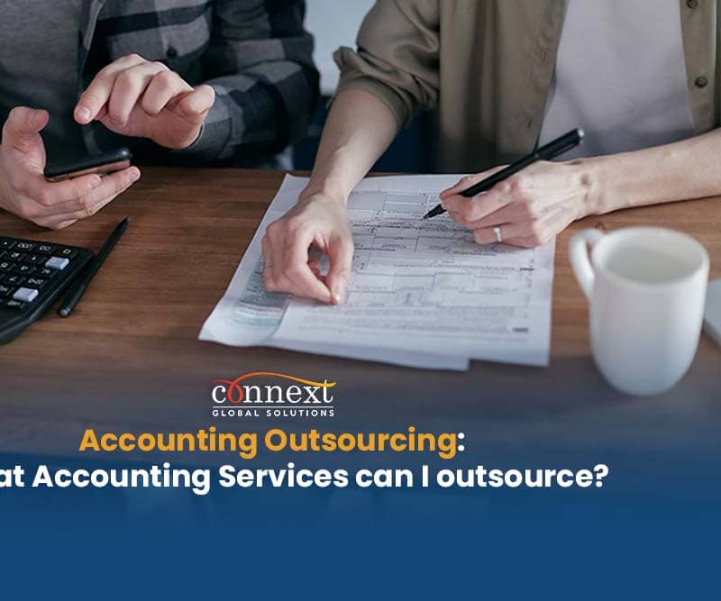 Accounting Industry Outlook and the Relevance of Accounting Outsourcing man holding a calculator woman writing on invoice