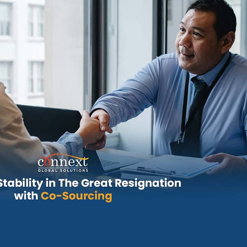 Creating Stability in The Great Resignation with Co-Sourcing corporate handshake