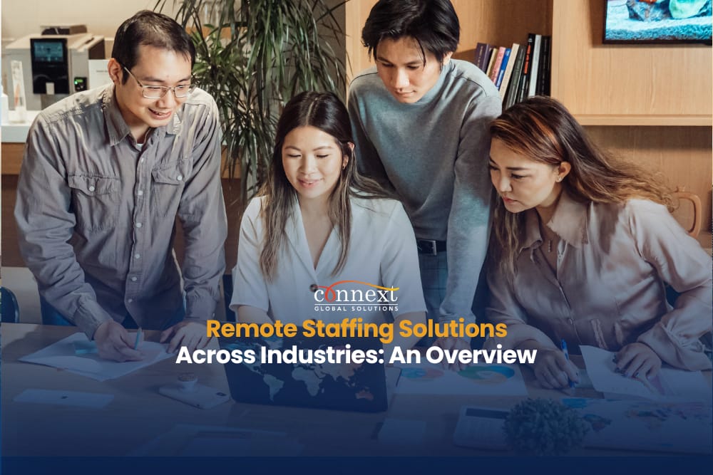 Remote staffing solutions across industries an overview group-of-people-asians-in-corporate-attire-having-a-meeting-in-the-office