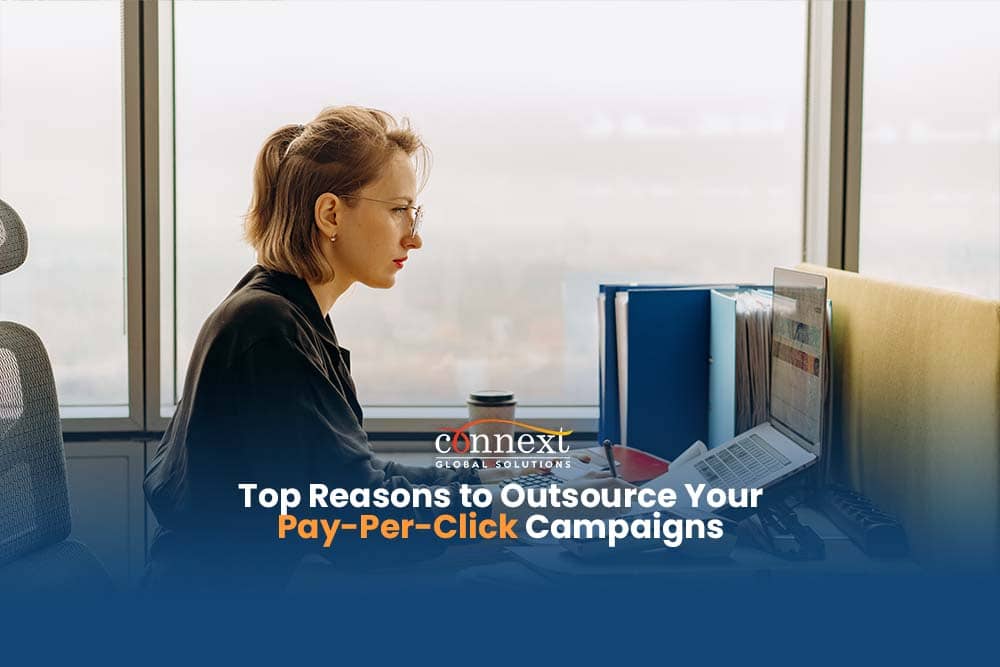 Why Outsource PPC The Top Reasons to Delegate Your Pay-Per-Click Campaigns woman using laptop