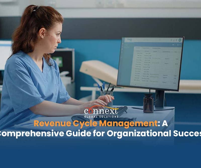 Revenue-Cycle-Management-A-Comprehensive-Guide-for-Organizational-Success-hospital-staff-woman-in-scrub-scuit-in-office-typing-data-into-computer-v0