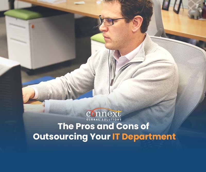 The-Pros-and-Cons-of-Outsourcing-Your-IT-Department-man-in-corporate-attire-with-computer-in-office-1@1x_1