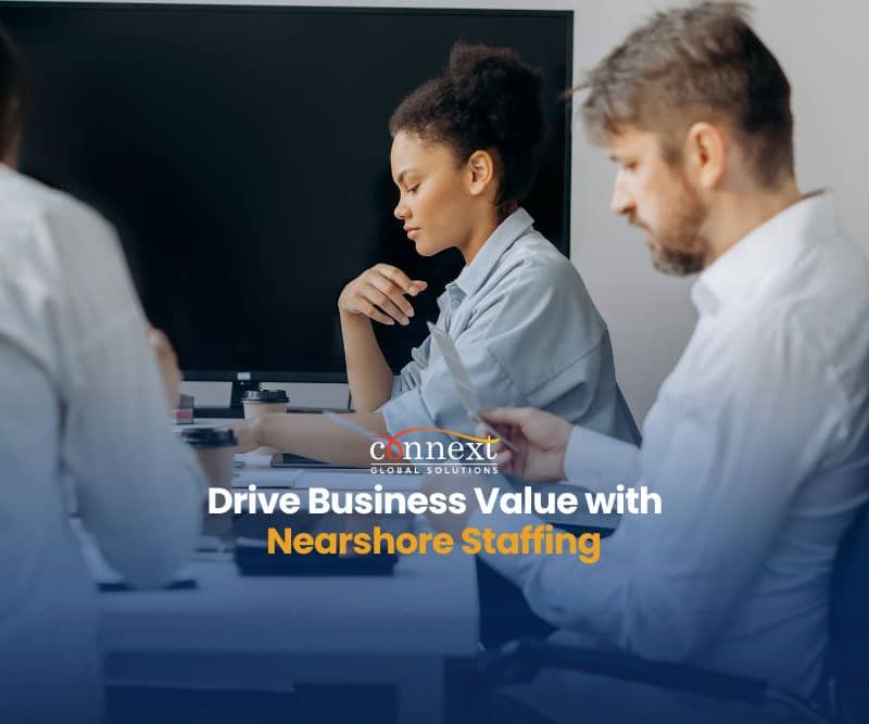 Drive-Business-Value-with-Nearshore-Staffing-people-in-office-in-a-group-meeting