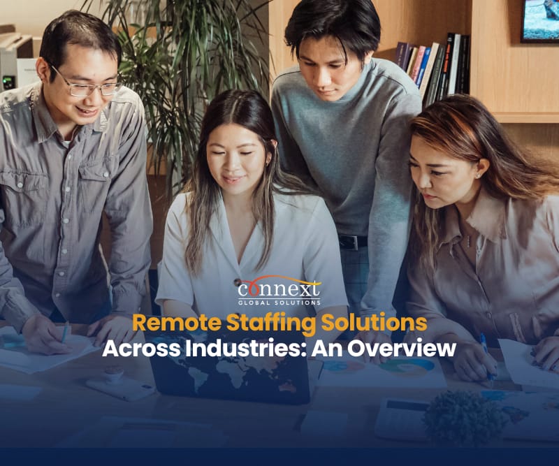 Remote staffing solutions across industries an overview group-of-people-asians-in-corporate-attire-having-a-meeting-in-the-office