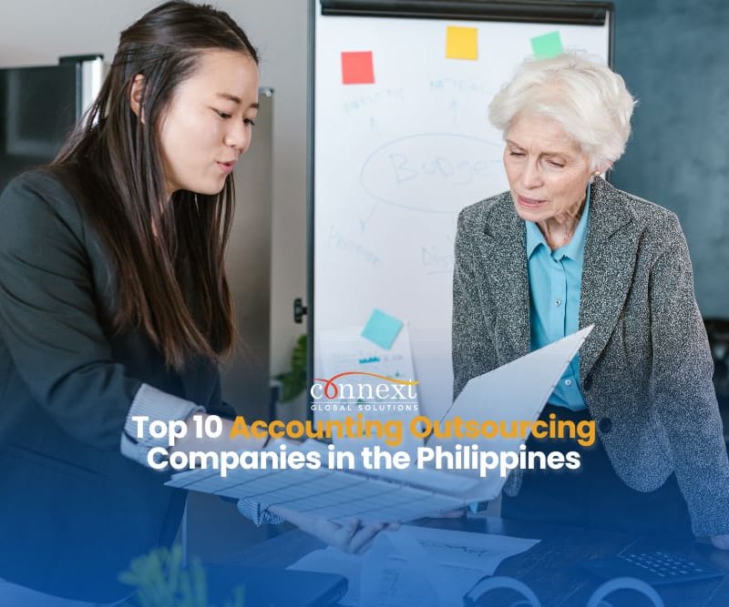 Top-10-Accounting-Outsourcing-Companies-in-the-Philippines-asian-office-staff-in-corporate-attire-in-a-meeting-holding-paperworks-in-office