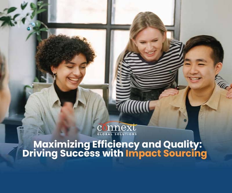 Maximizing Efficiency and Quality Driving Success with Impact Sourcing a-group-of-people-having-a-meeting-in-the-office-1@1x_1