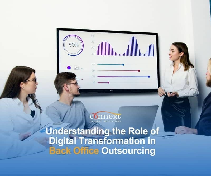 Understanding-the-Role-of-Digital-Transformation-in-Back-Office-Outsourcing-a-woman-doing-a-presentation-at-a-meeting-5716030