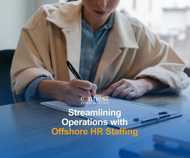 streamlining operations with hr staffing focused-woman-writing-clipboard-while-hiring.jpg