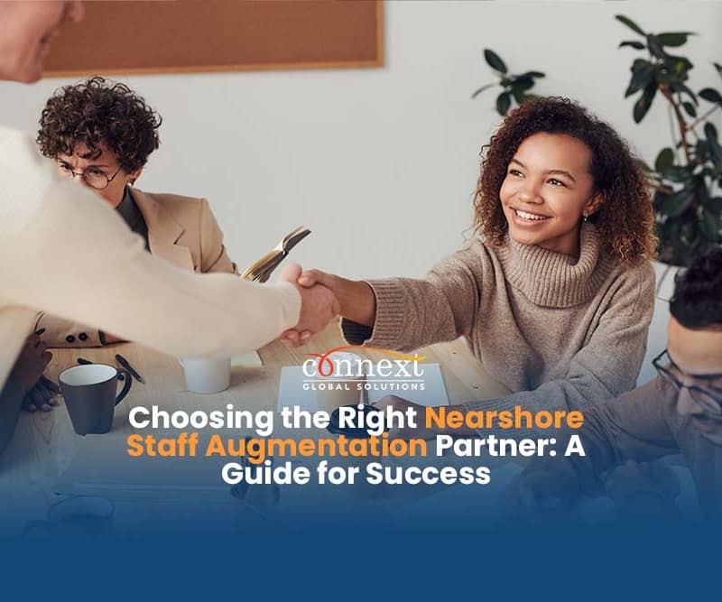 Choosing the Right Nearshore Staff Augmentation Partner: A Guide for Success woman in office attire in team meeting