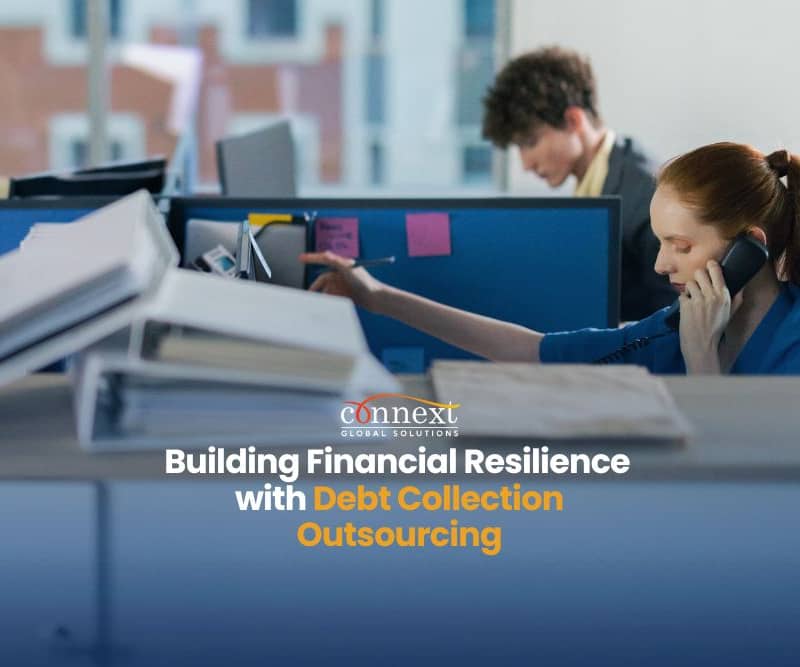 Building-Financial-Resilience-with-Debt-Collection-Outsourcing-woman-debt-collection-agent-with-files-in-corporate-office-using-company-telephone-2