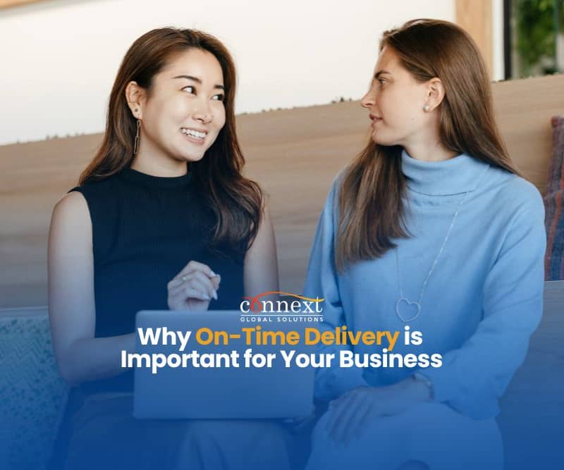 Why on-time delivery is important for your business women asian caucasian in corporate office attire talking with laptop
